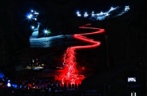 Skiing and Snowboarding torch run